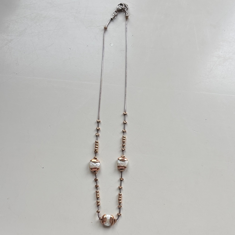 Elegant Gold and Silver Necklace